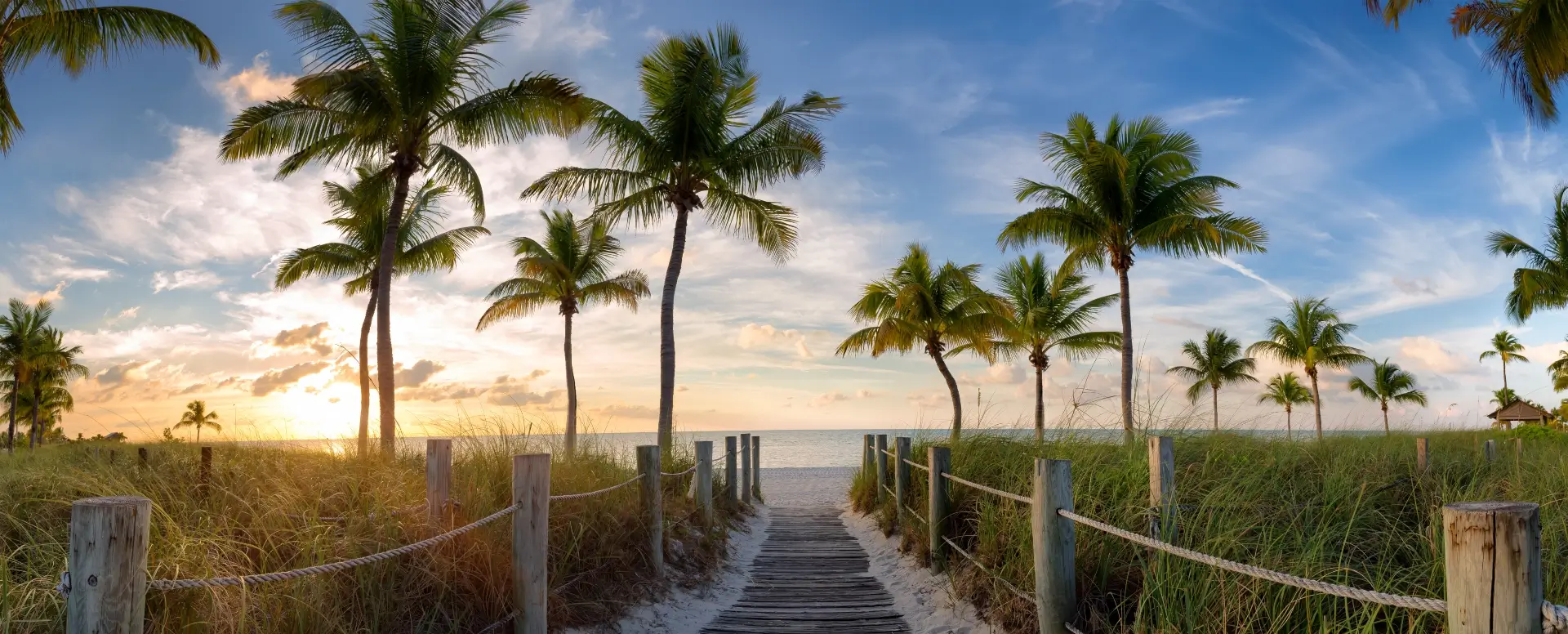 Panorama view of footbridge to the Smathers beach at sunrise - Key West, Florida