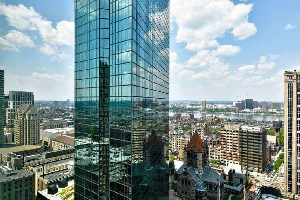 Hancock Tower glass facade with Back Bay and the Charles beyond