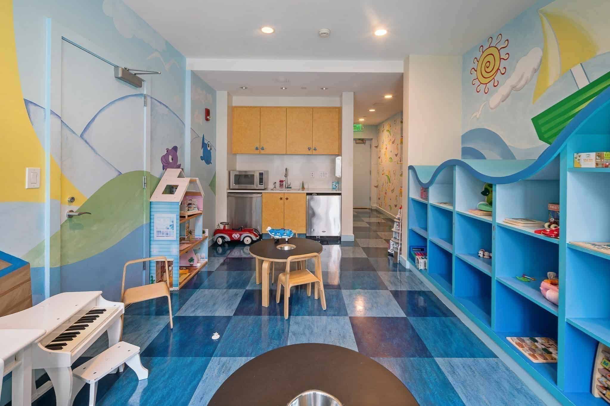 Children's playroom with painted murals and toys