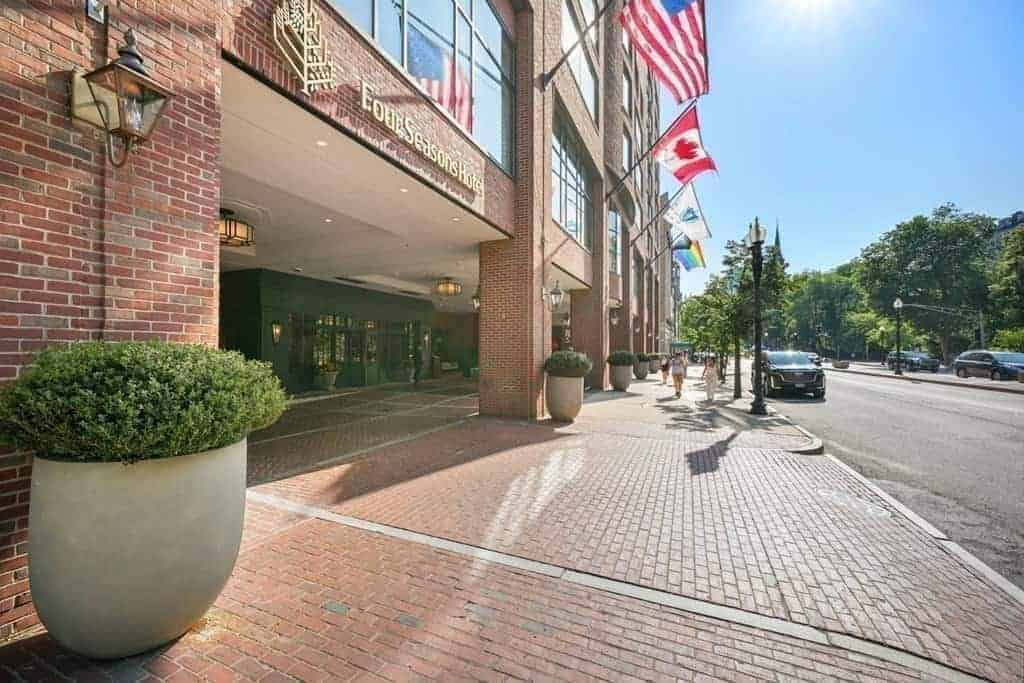 The Four Seasons Hotel entrance canopy with flags on Boylston Street