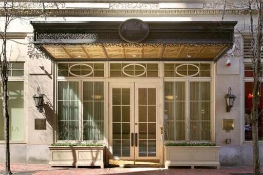 Ornate canopied entrance at 250 Boylston Street