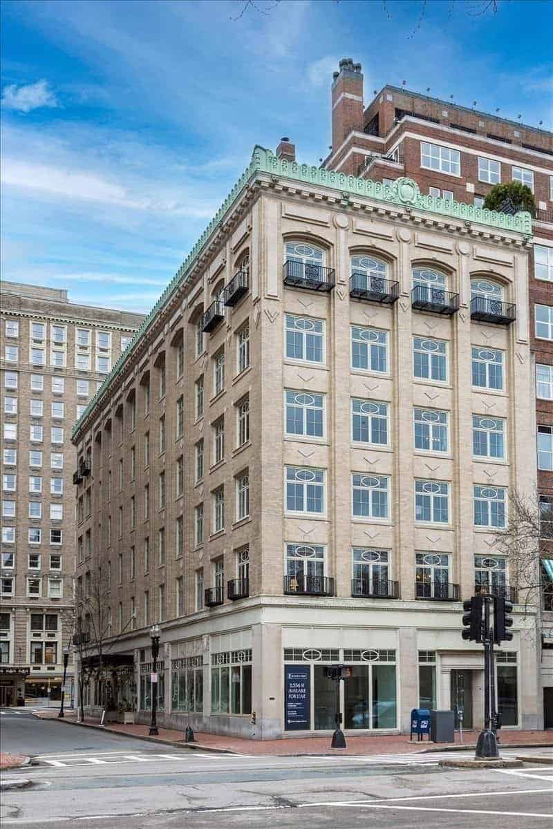 The limestone facade and copper cornice of 250 Boylston Street