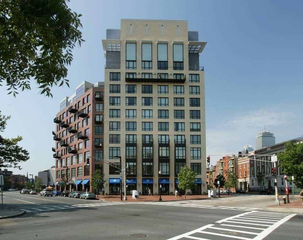 The limestone facade of 505 Atelier at the Tremont Street corner