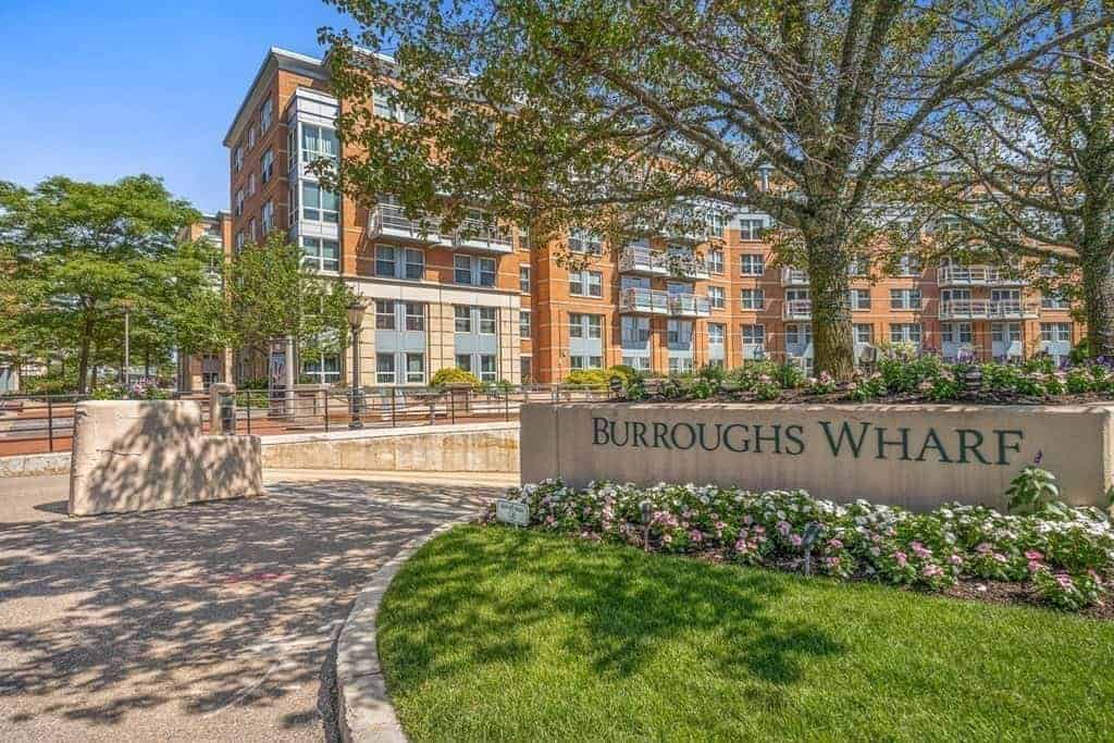 The Burroughs Wharf entrance sign and landscaped courtyard