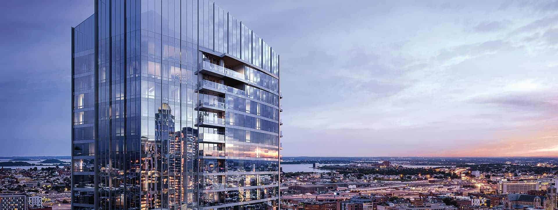 Raffles Boston glass tower above the city at dusk