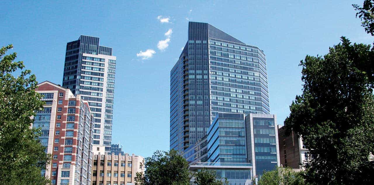 The Ritz-Carlton Towers rising above the Boston Common treeline