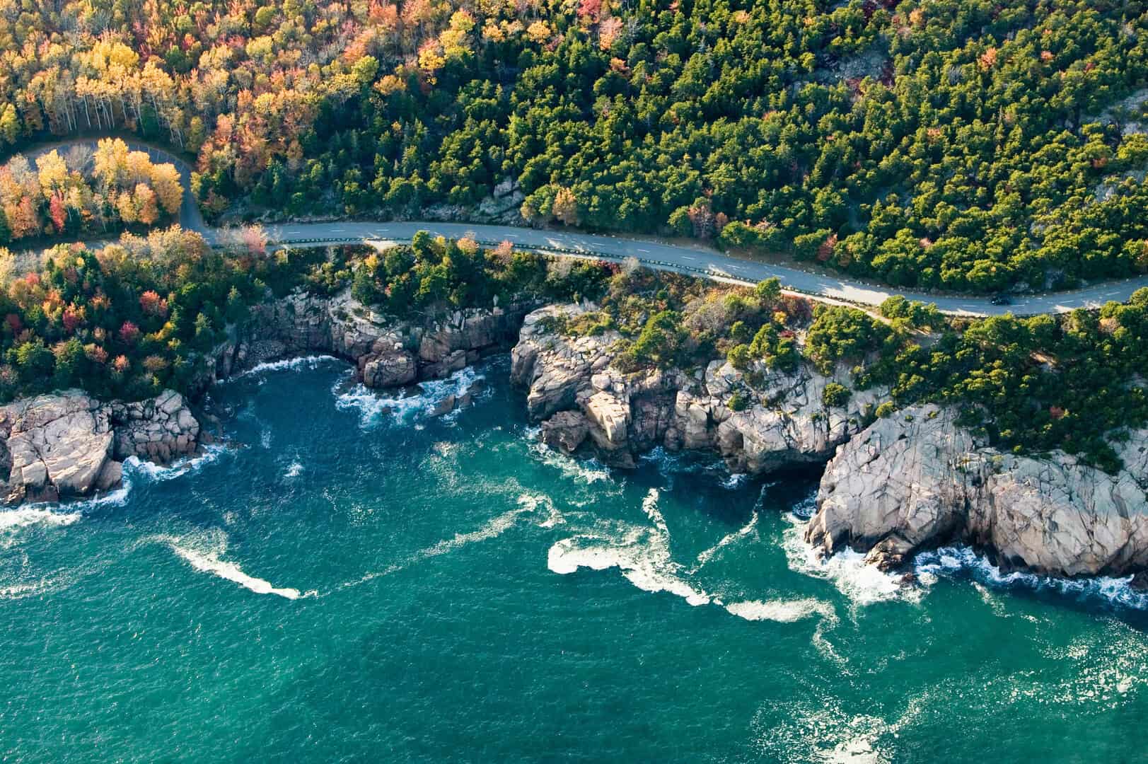 Famous lighthouse on cliff in Cape Elizabeth, Maine at dusk