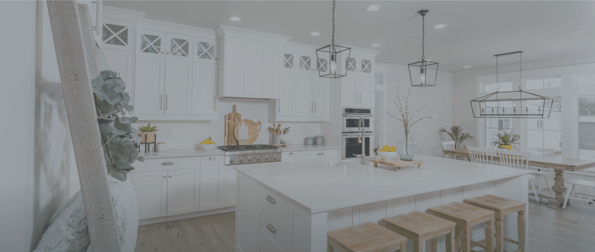Interior photo of white kitchen with island