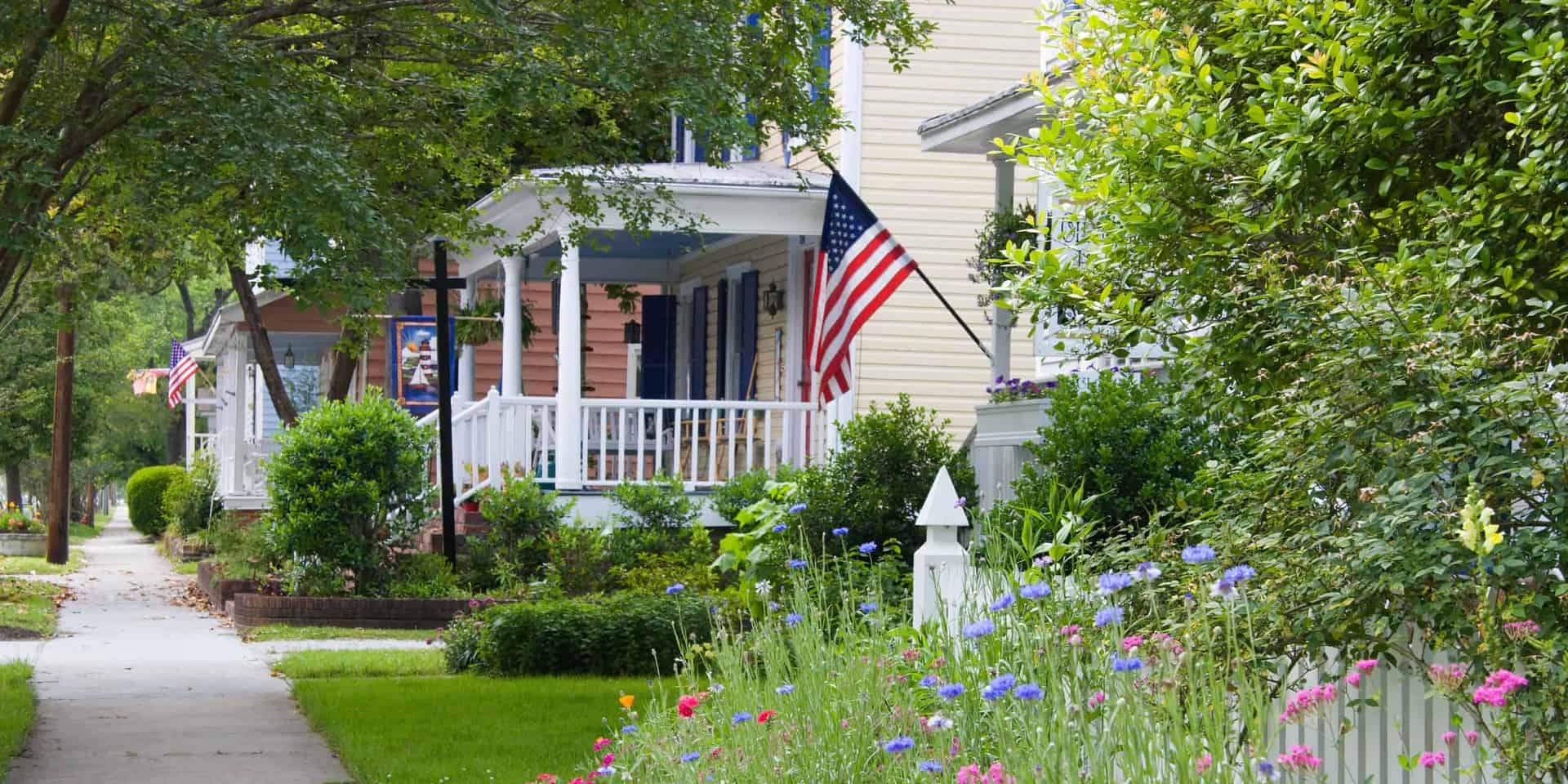 neighborhood sidewalk with houses