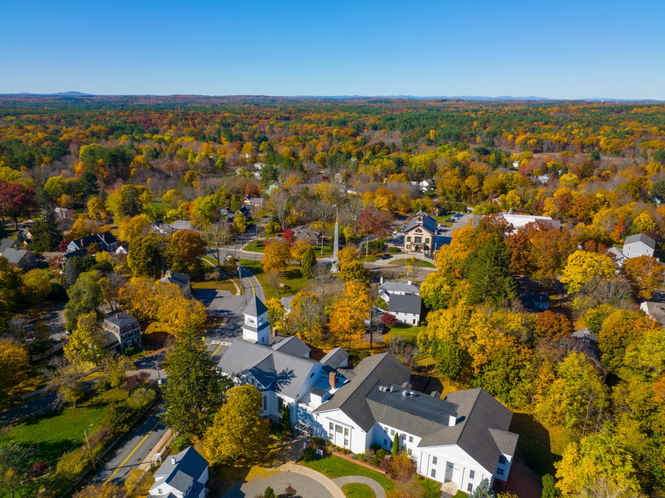 Acton Town Green aerial view in fall in historic town center of Acton